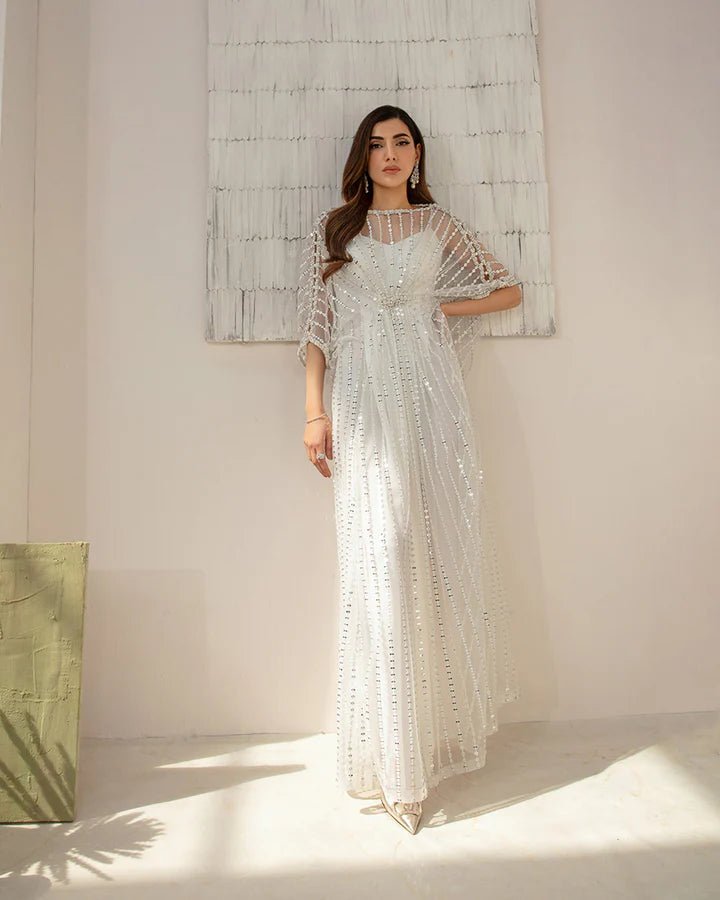 model wearing Faiza Saqlain Ariella, sequined white Pakistani wedding dress in UK