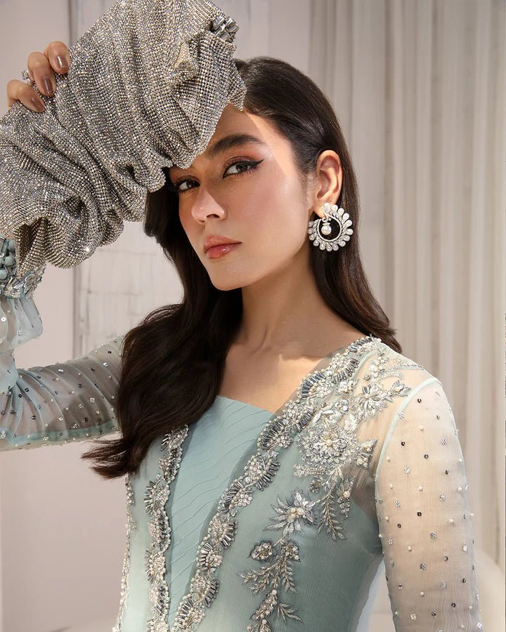 Model wearing a pastel blue Myria dress from Faiza Saqlain's Lenora Luxury Pret '24 collection. Pakistani clothes online in UK.