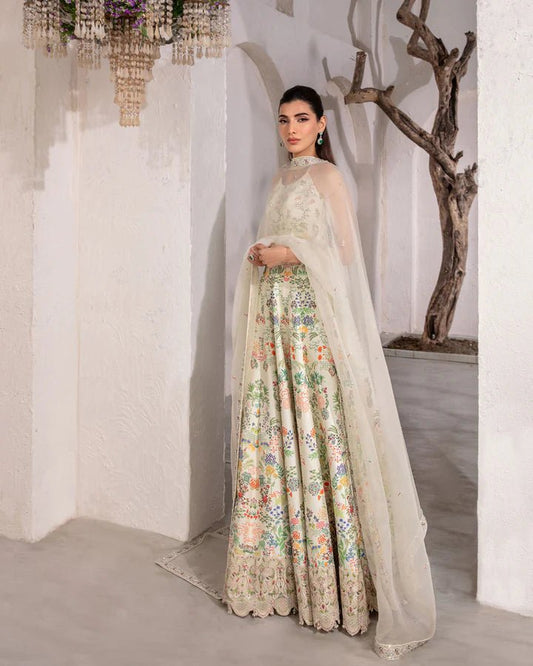 model wearing Faiza Saqlain Floretta with floral embroidery, Pakistani wedding dress in UK