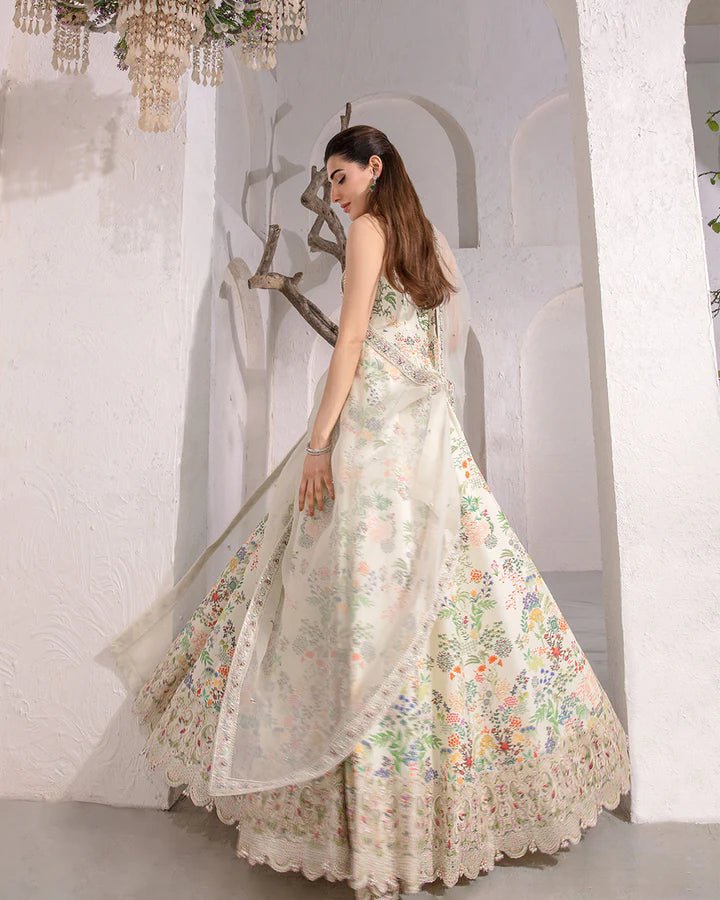 model wearing Faiza Saqlain Floretta with floral embroidery, Pakistani wedding dress in UK