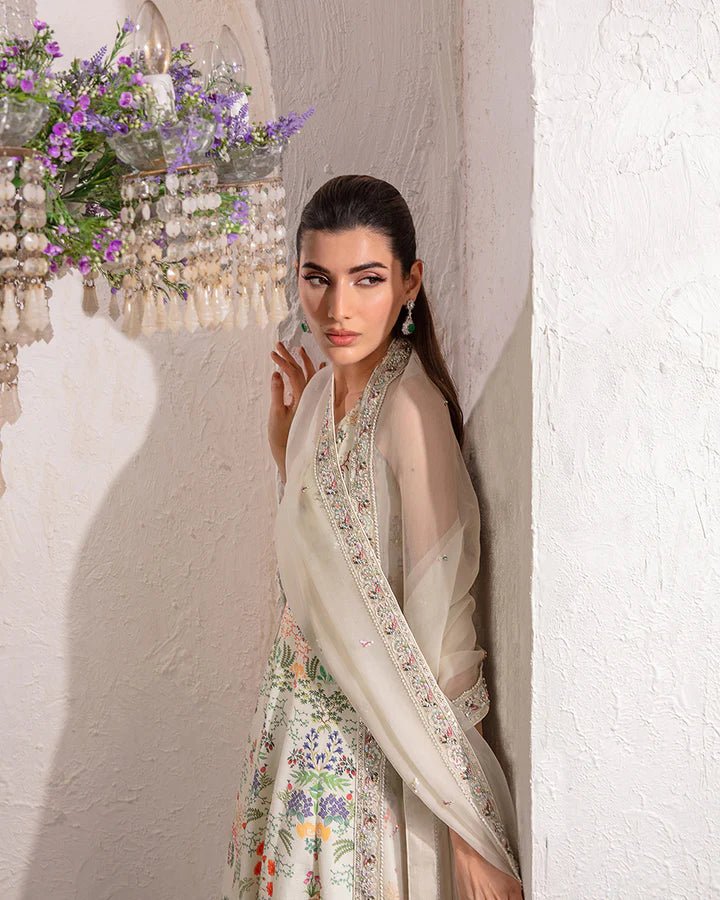 model wearing Faiza Saqlain Floretta with floral embroidery, Pakistani wedding dress in UK