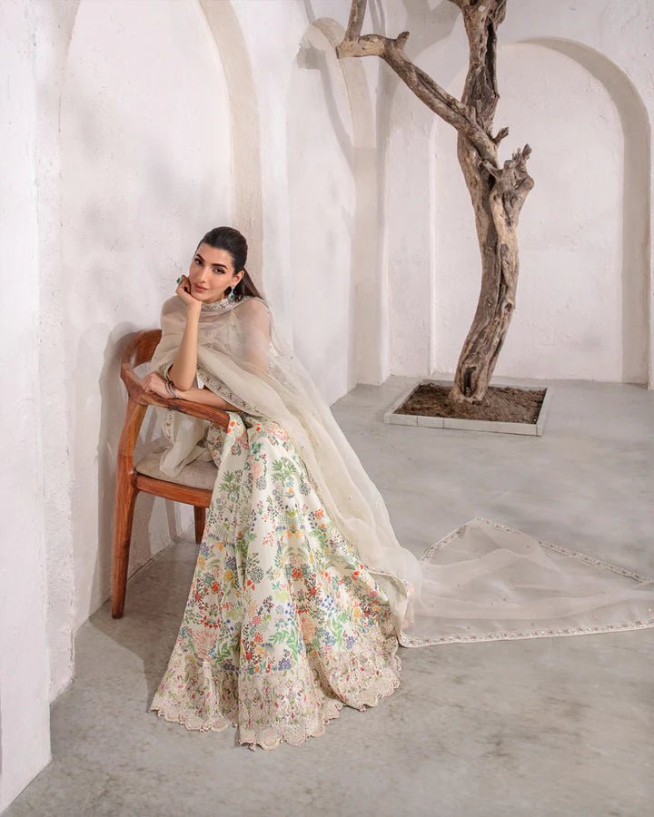 model wearing Faiza Saqlain Floretta with floral embroidery, Pakistani wedding dress in UK