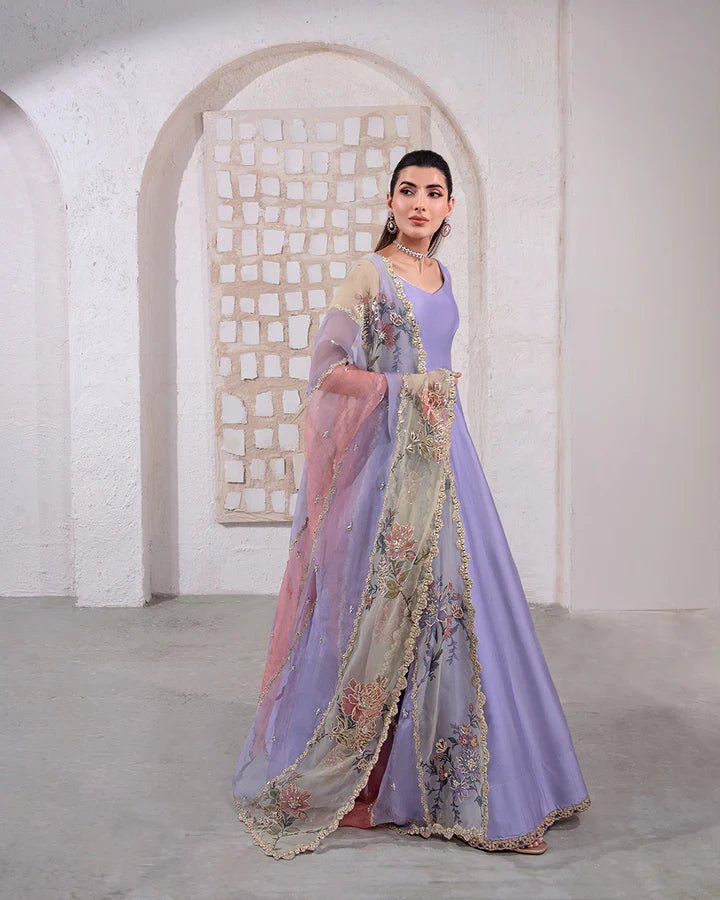 Model wearing a pastel lavender and peach Keva dress from Faiza Saqlain's Lenora Luxury Pret '24 collection. Pakistani clothes online in UK.