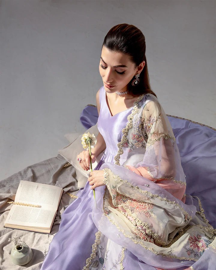 Model wearing a pastel lavender and peach Keva dress from Faiza Saqlain's Lenora Luxury Pret '24 collection. Pakistani clothes online in UK.