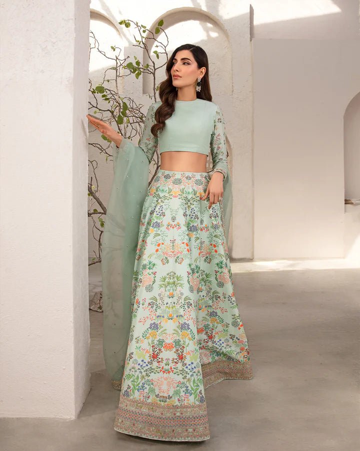 Model wearing a mint green Myria dress with floral embroidery from Faiza Saqlain's Lenora Luxury Pret '24 collection. Pakistani clothes online in UK.