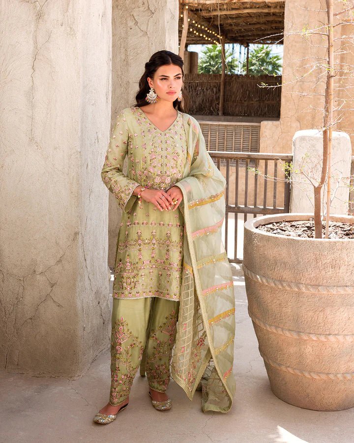 Model in Faiza Saqlain UK Noya attire, elegant Pakistani clothes UK, Luxe Formals Laira May '23 collection.