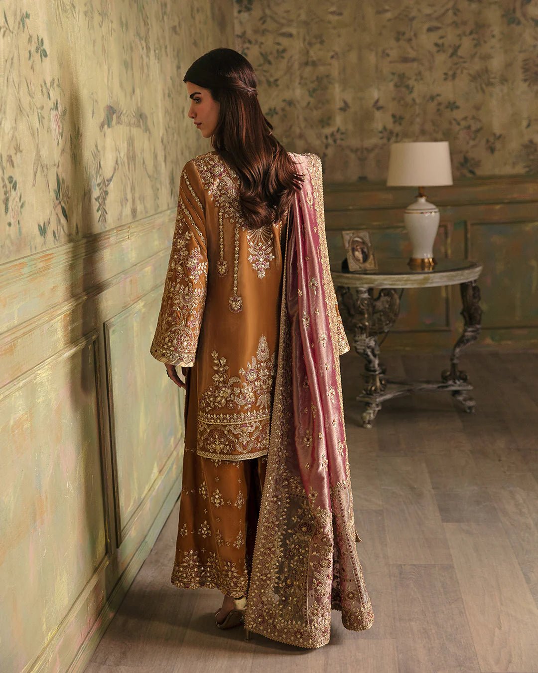 Model wearing Faiza Saqlain Luxe Formals Manaar Nov '23 Lamees dress in teal, Pakistani clothes online in UK.