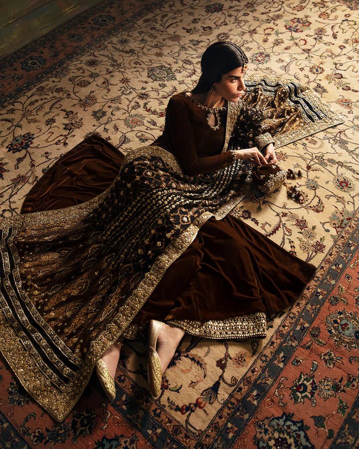 Model wearing Faiza Saqlain Luxe Formals Manaar Nov '23 Ritaan dress in maroon, Pakistani clothes online in UK.