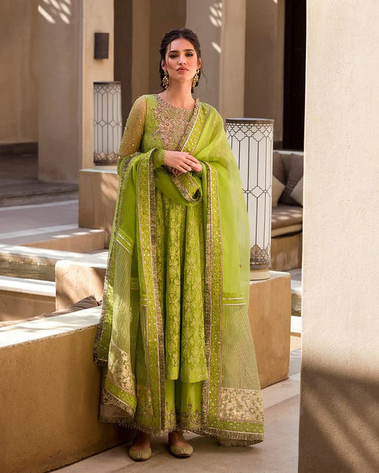 Model presents Faiza Saqlain UK Reya, Pakistani clothes UK, in vibrant green from Noor e Chashm Feb '23.