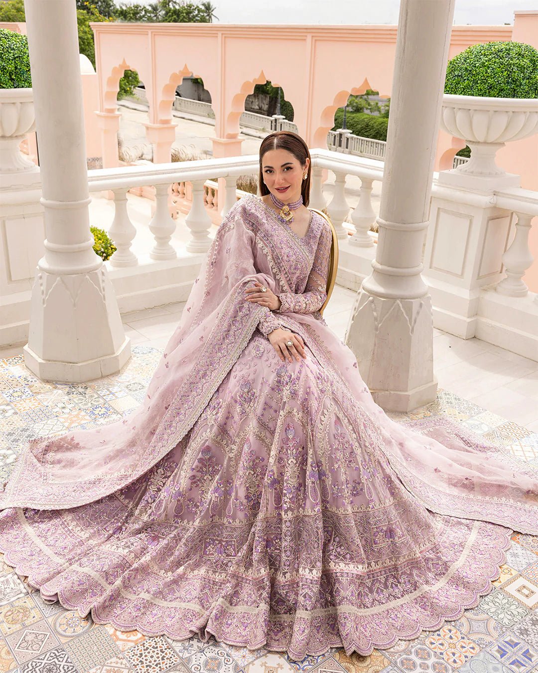 Model wearing Anysia from Faiza Saqlain's Neorah Wedding Festive '24 in stunning colors. Pakistani wedding clothes online in UK at Signature Labels