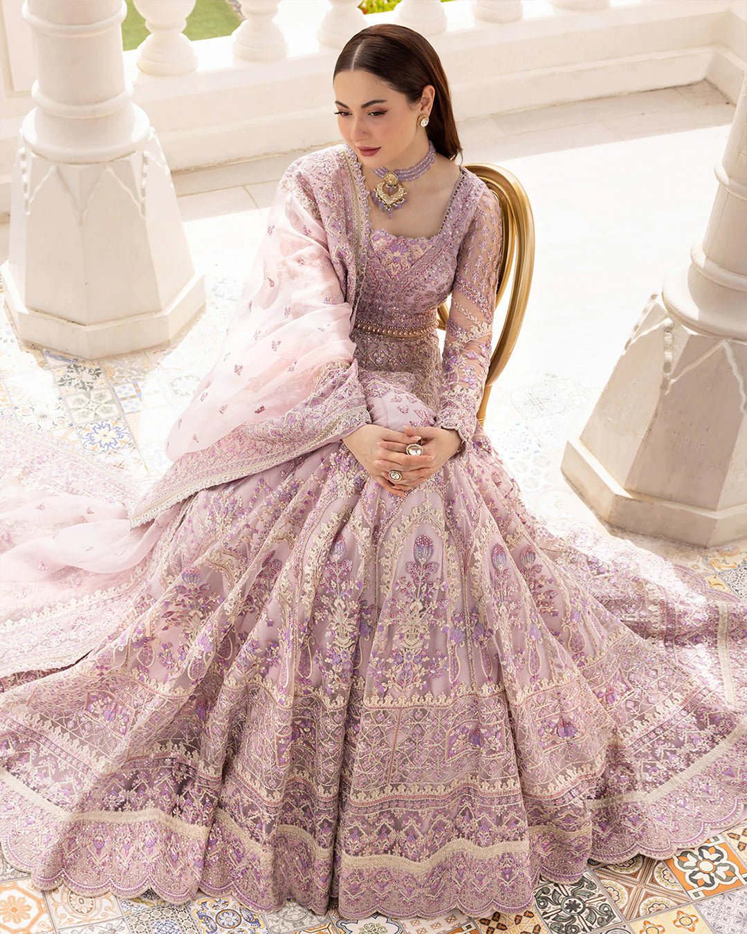 Model wearing Anysia from Faiza Saqlain's Neorah Wedding Festive '24 in stunning colors. Pakistani wedding clothes online in UK at Signature Labels