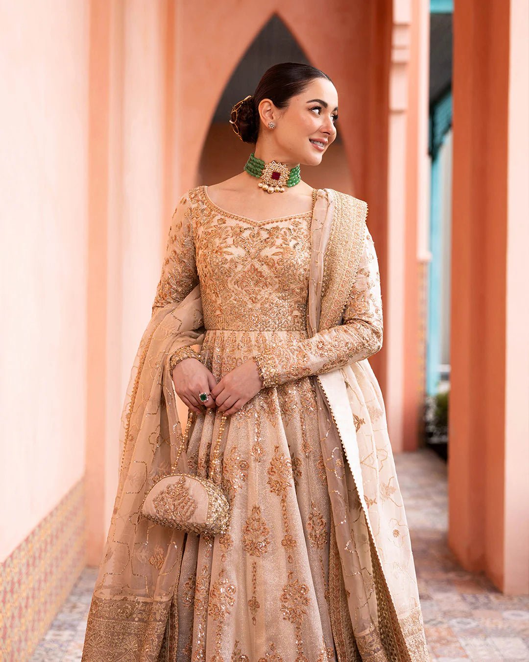 Model wearing Jenaya from Faiza Saqlain's Neorah Wedding Festive '24 in vibrant colors. Pakistani wedding clothes online in UK at Signature Labels