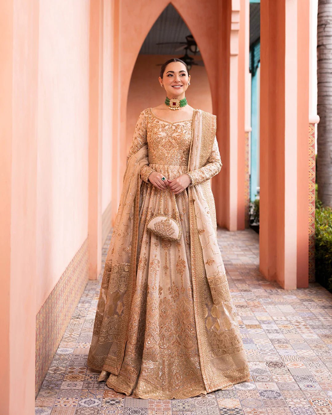 Model wearing Jenaya from Faiza Saqlain's Neorah Wedding Festive '24 in vibrant colors. Pakistani wedding clothes online in UK at Signature Labels