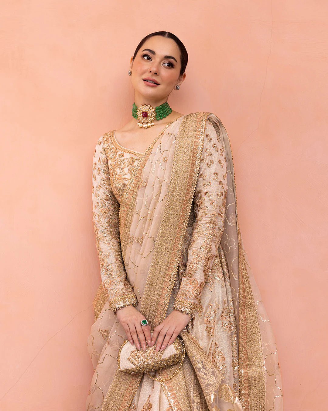 Model wearing Jenaya from Faiza Saqlain's Neorah Wedding Festive '24 in vibrant colors. Pakistani wedding clothes online in UK at Signature Labels