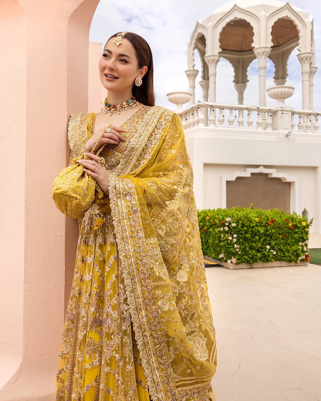 Model wearing Melita from Faiza Saqlain's Neorah Wedding Festive '24 in elegant tones. Pakistani wedding clothes online in UK at Signature Labels