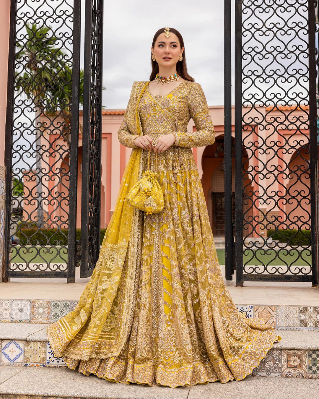 Model wearing Melita from Faiza Saqlain's Neorah Wedding Festive '24 in elegant tones. Pakistani wedding clothes online in UK at Signature Labels