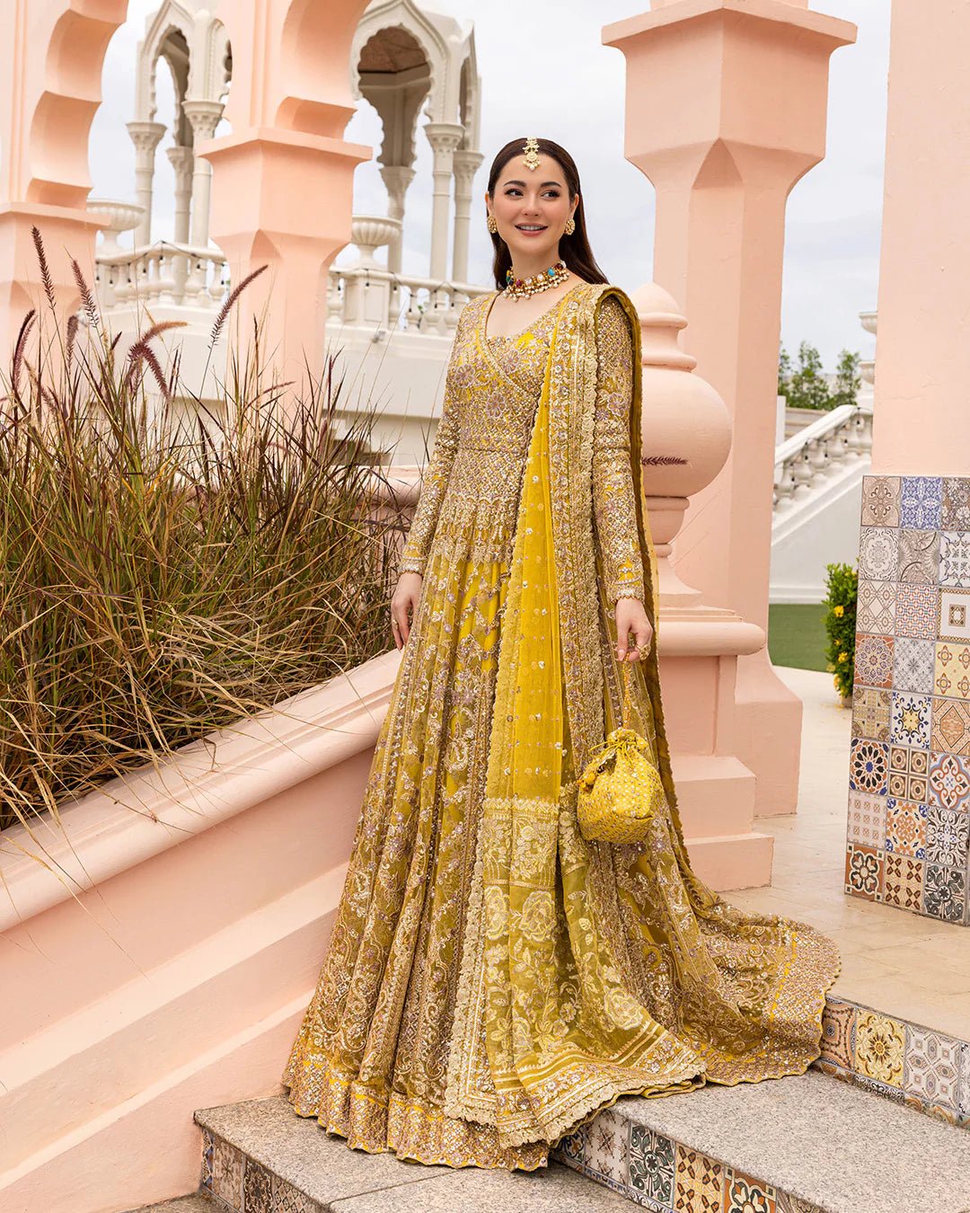 Model wearing Melita from Faiza Saqlain's Neorah Wedding Festive '24 in elegant tones. Pakistani wedding clothes online in UK at Signature Labels