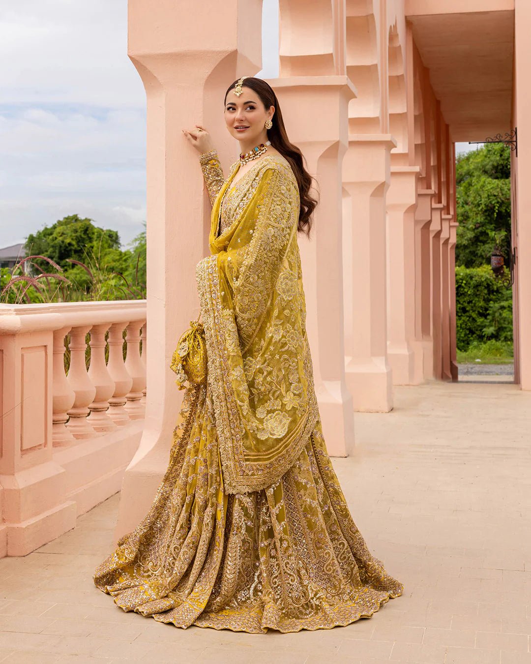 Model wearing Melita from Faiza Saqlain's Neorah Wedding Festive '24 in elegant tones. Pakistani wedding clothes online in UK at Signature Labels