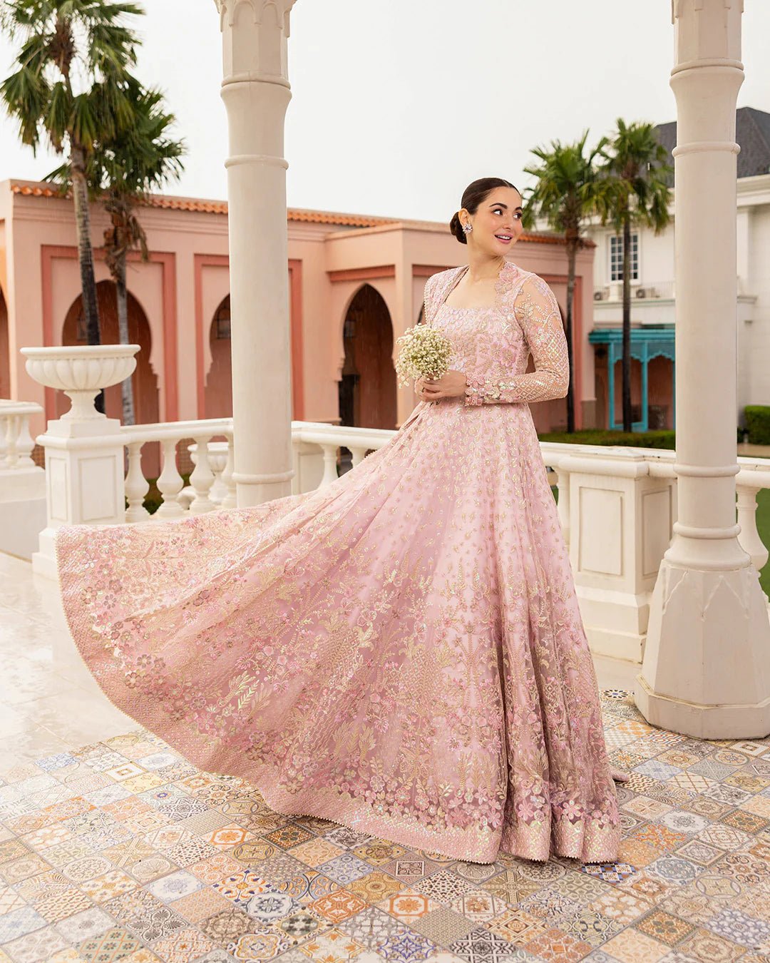 Model wearing Ruzova from Faiza Saqlain's Neorah Wedding Festive '24 in beautiful hues. Pakistani wedding clothes online in UK at Signature Labels