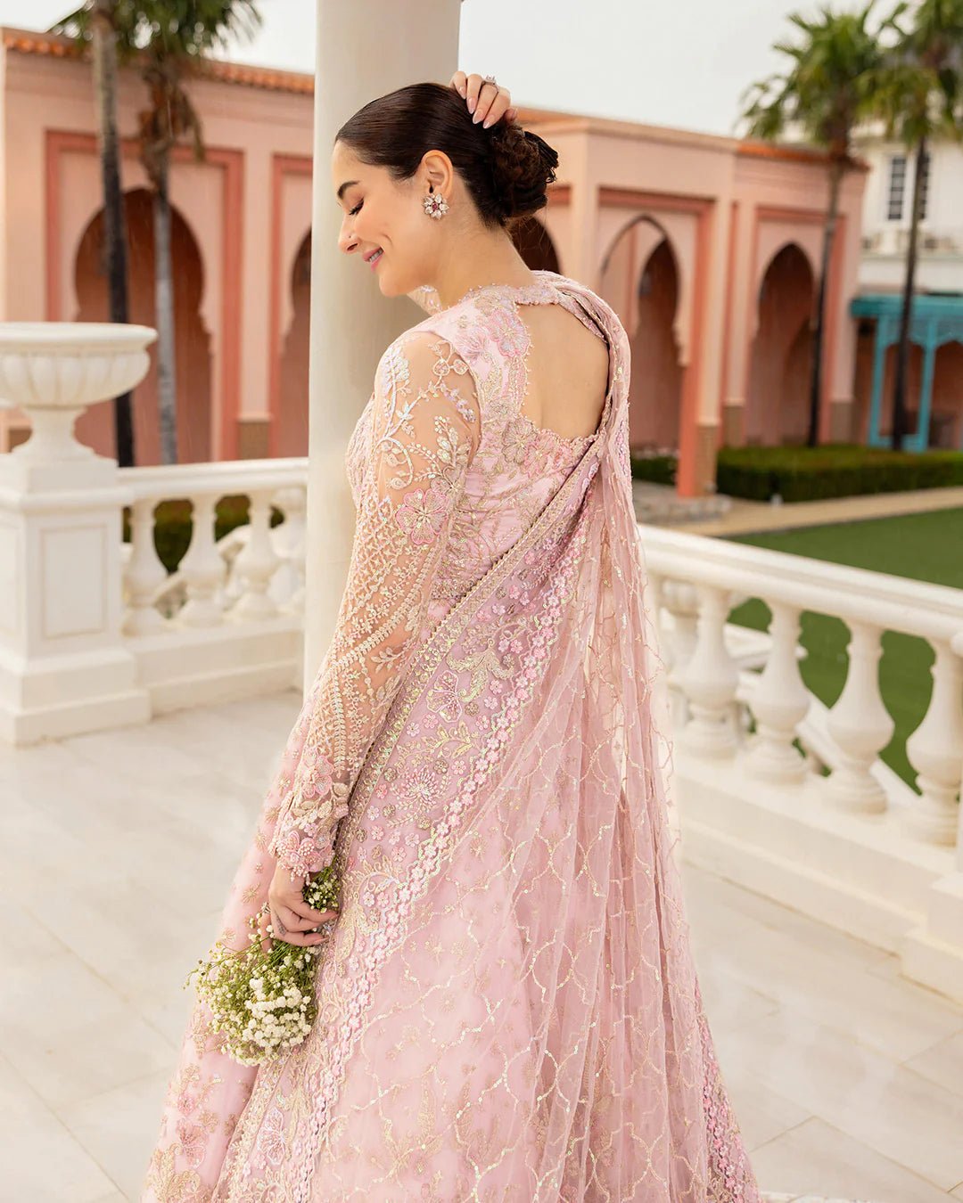 Model wearing Ruzova from Faiza Saqlain's Neorah Wedding Festive '24 in beautiful hues. Pakistani wedding clothes online in UK at Signature Labels