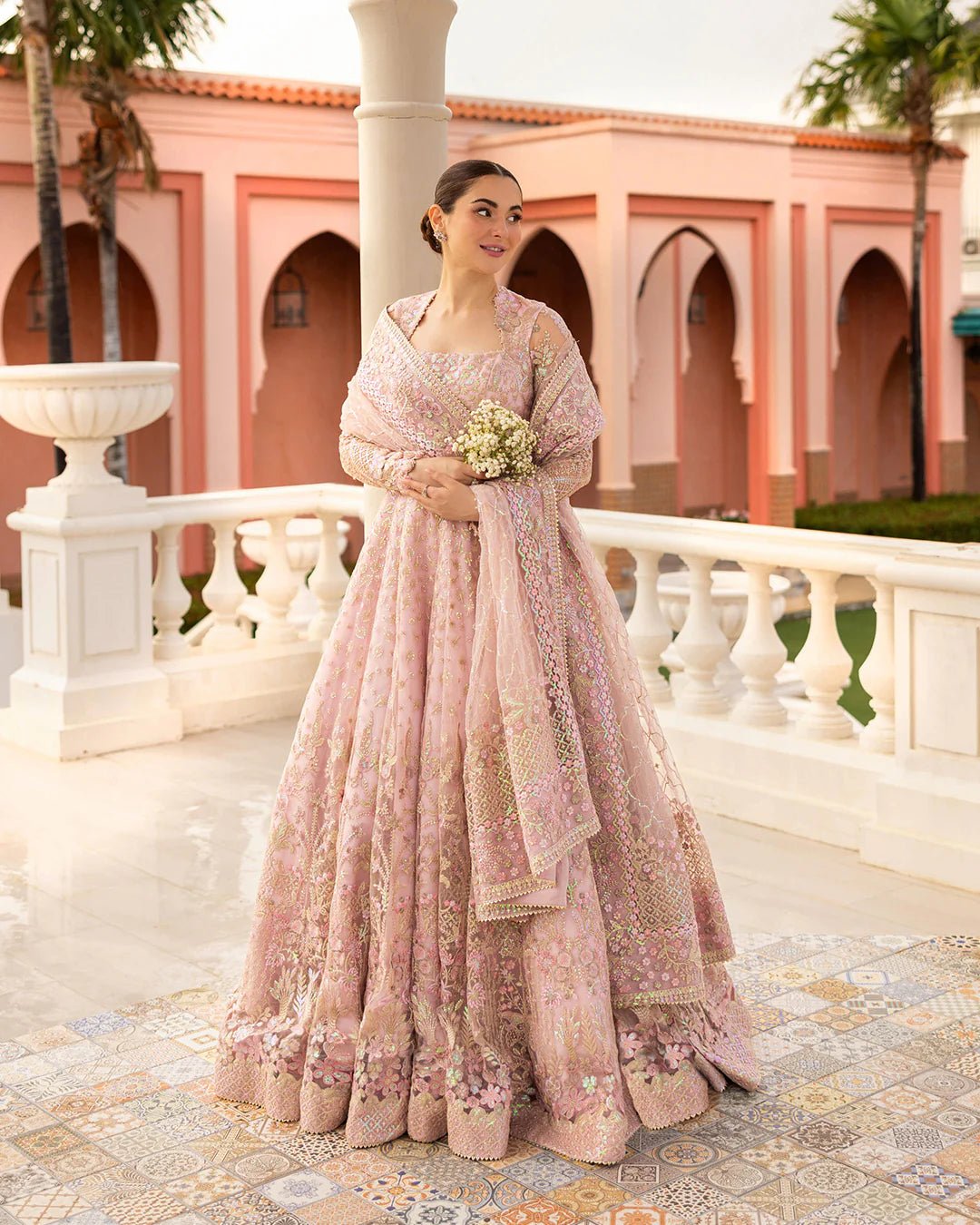 Model wearing Ruzova from Faiza Saqlain's Neorah Wedding Festive '24 in beautiful hues. Pakistani wedding clothes online in UK at Signature Labels