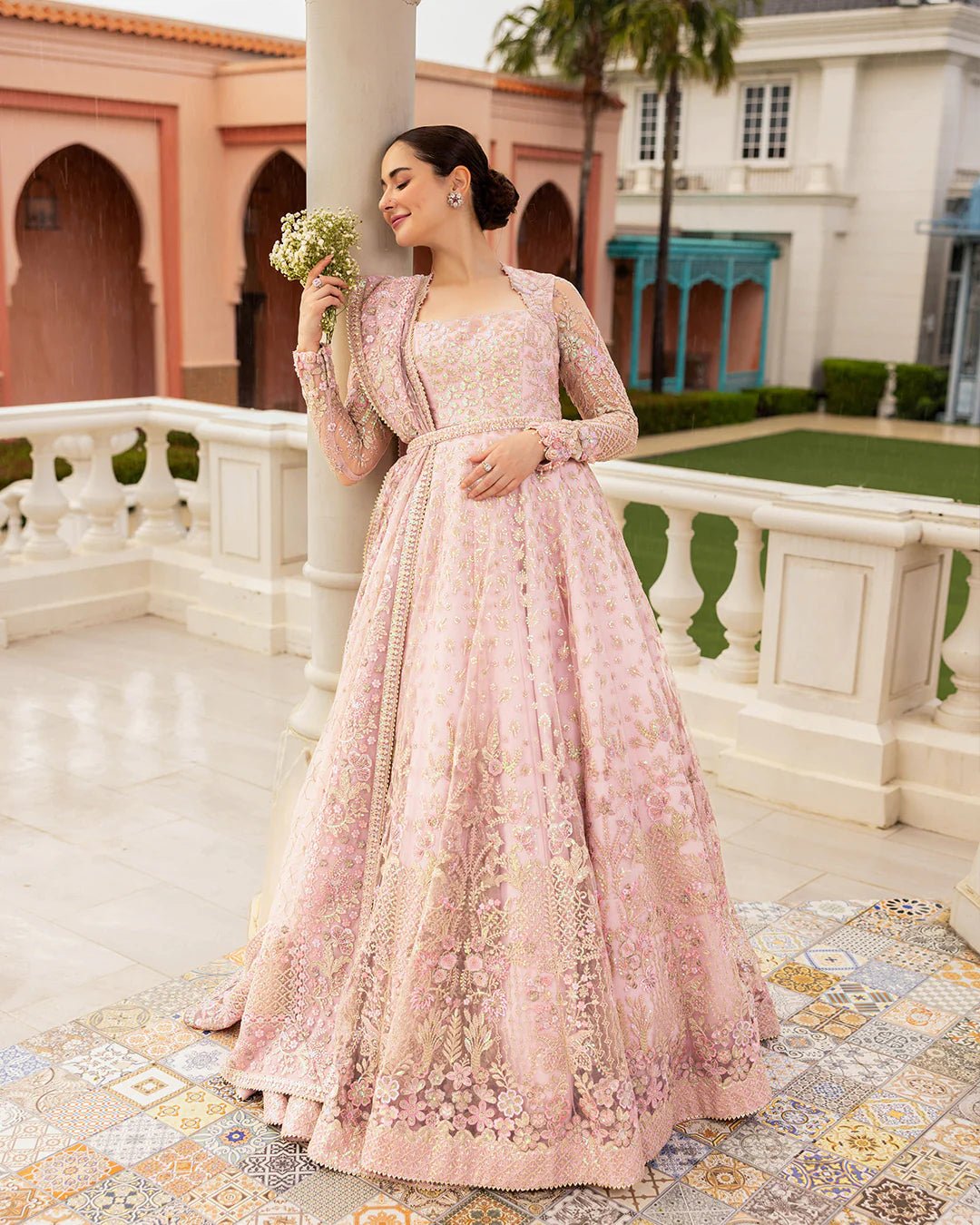 Model wearing Ruzova from Faiza Saqlain's Neorah Wedding Festive '24 in beautiful hues. Pakistani wedding clothes online in UK at Signature Labels