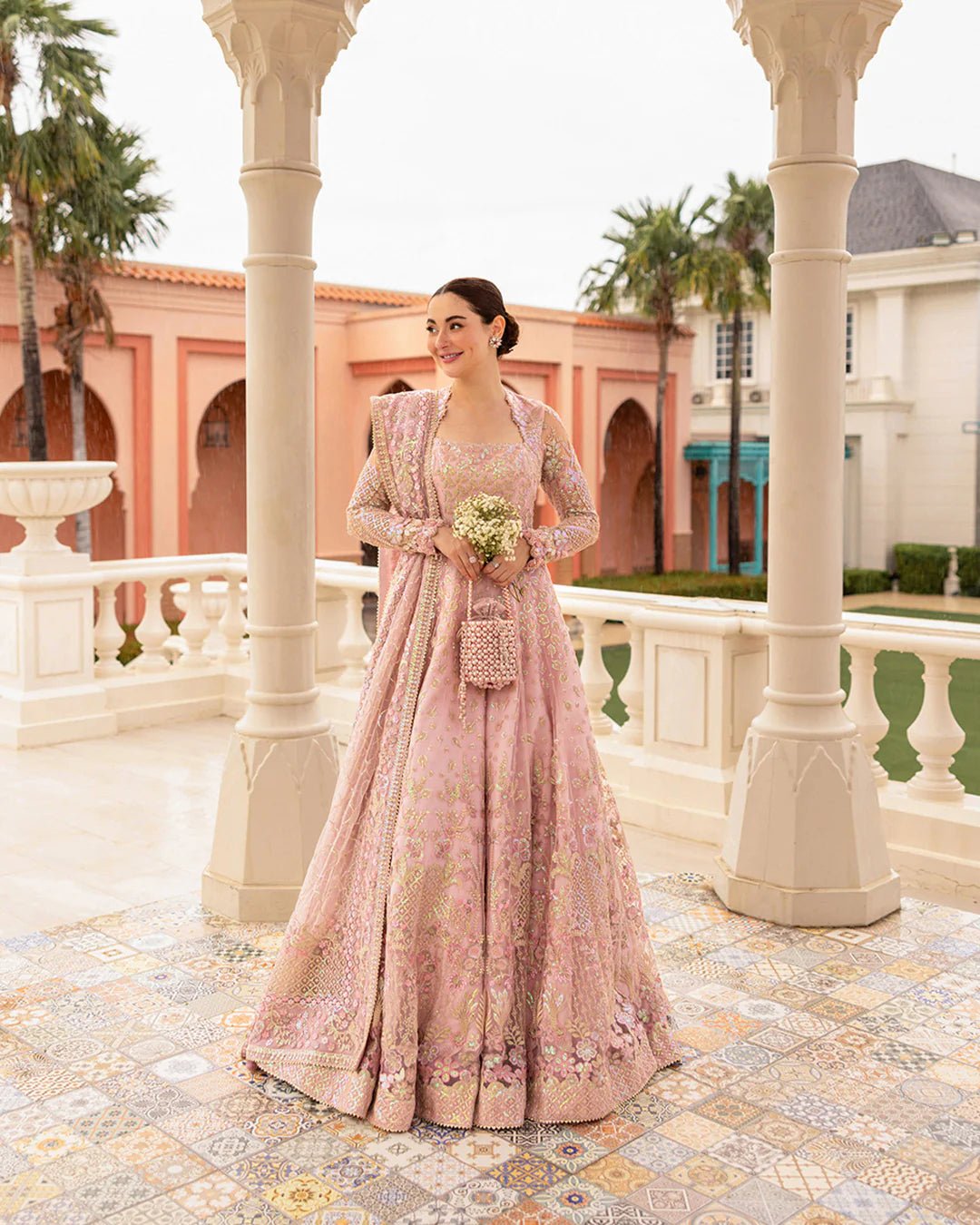 Model wearing Ruzova from Faiza Saqlain's Neorah Wedding Festive '24 in beautiful hues. Pakistani wedding clothes online in UK at Signature Labels