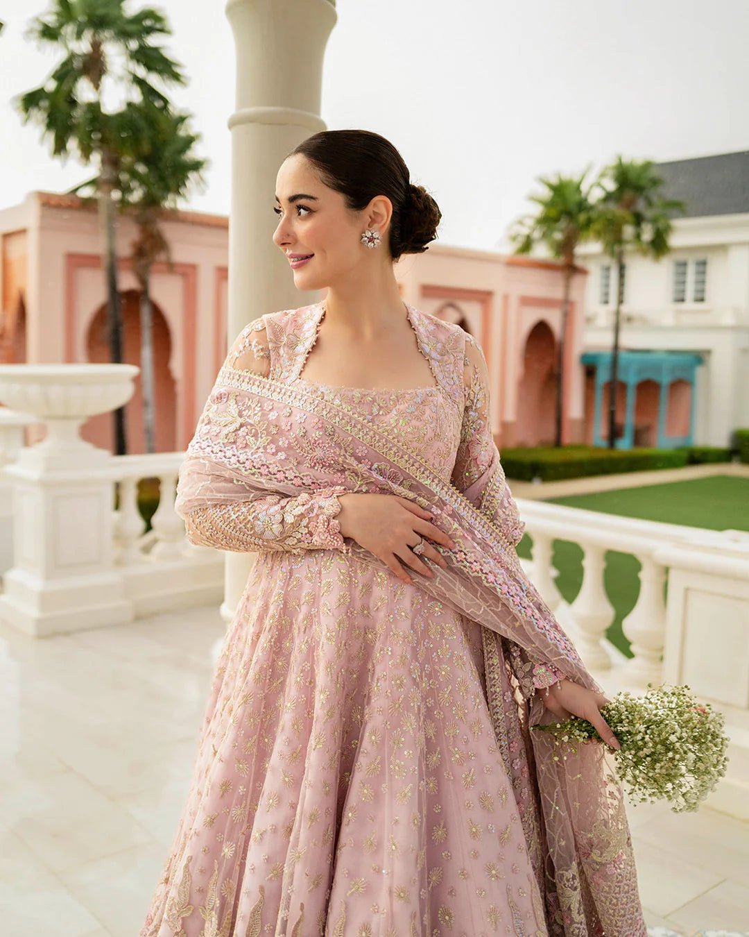 Model wearing Ruzova from Faiza Saqlain's Neorah Wedding Festive '24 in beautiful hues. Pakistani wedding clothes online in UK at Signature Labels