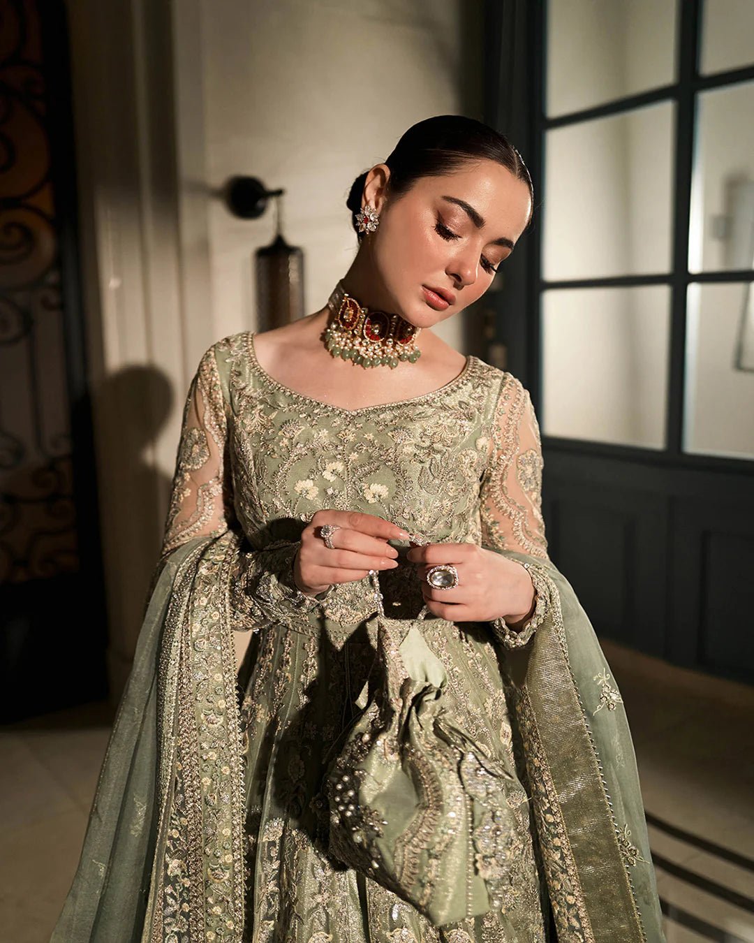 Model wearing Syene from Faiza Saqlain's Neorah Wedding Festive '24 in elegant hues. Pakistani wedding clothes online in UK at Signature Labels