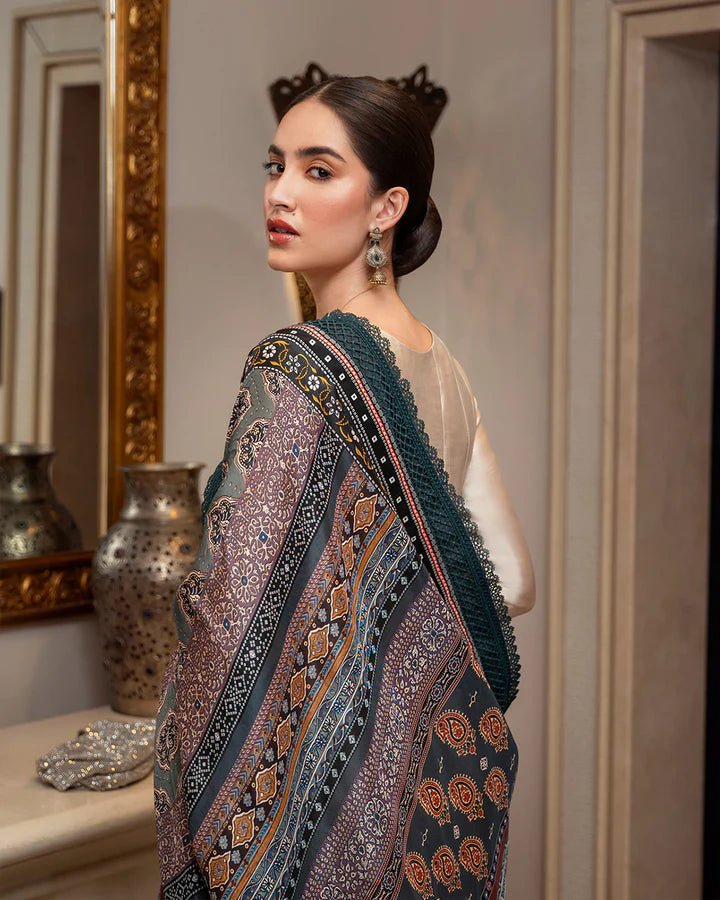 Model wearing a stylish beige Leora dress with a richly patterned shawl from Faiza Saqlain's Zurina Luxe Silk Edit '24 collection. Pakistani clothes online in UK.