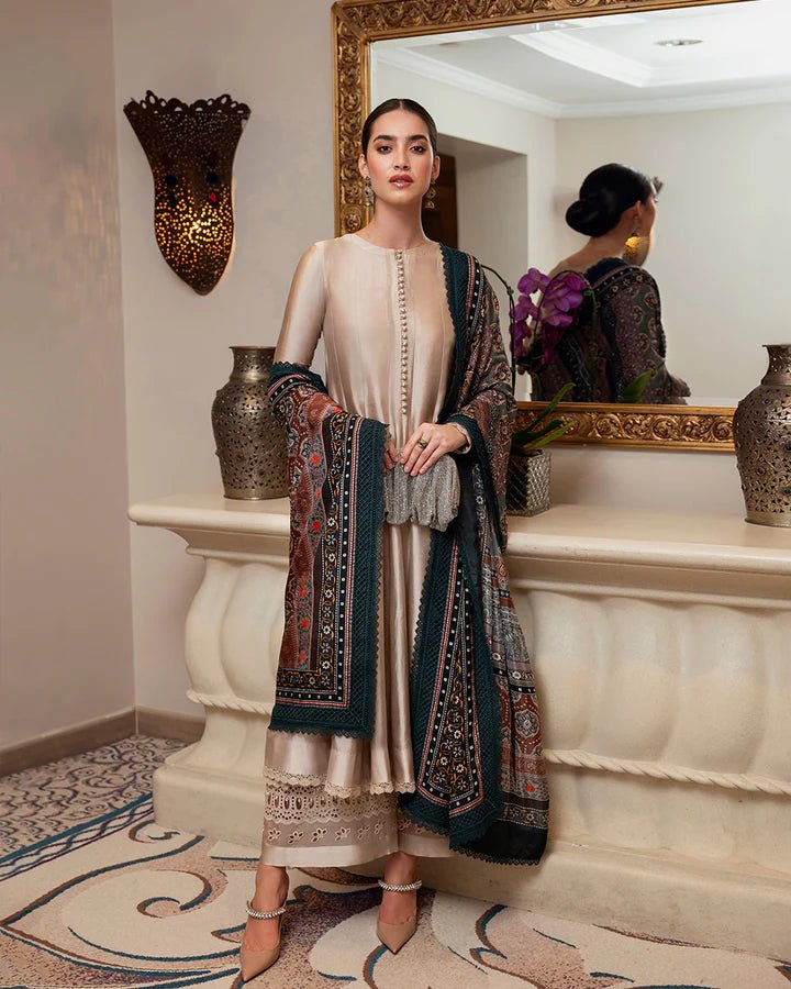 Model wearing the Leora dress from Faiza Saqlain Zurina Luxe Silk Edit '24 in beige with an intricately printed shawl, perfect for Pakistani designer Eid dresses in the UK.