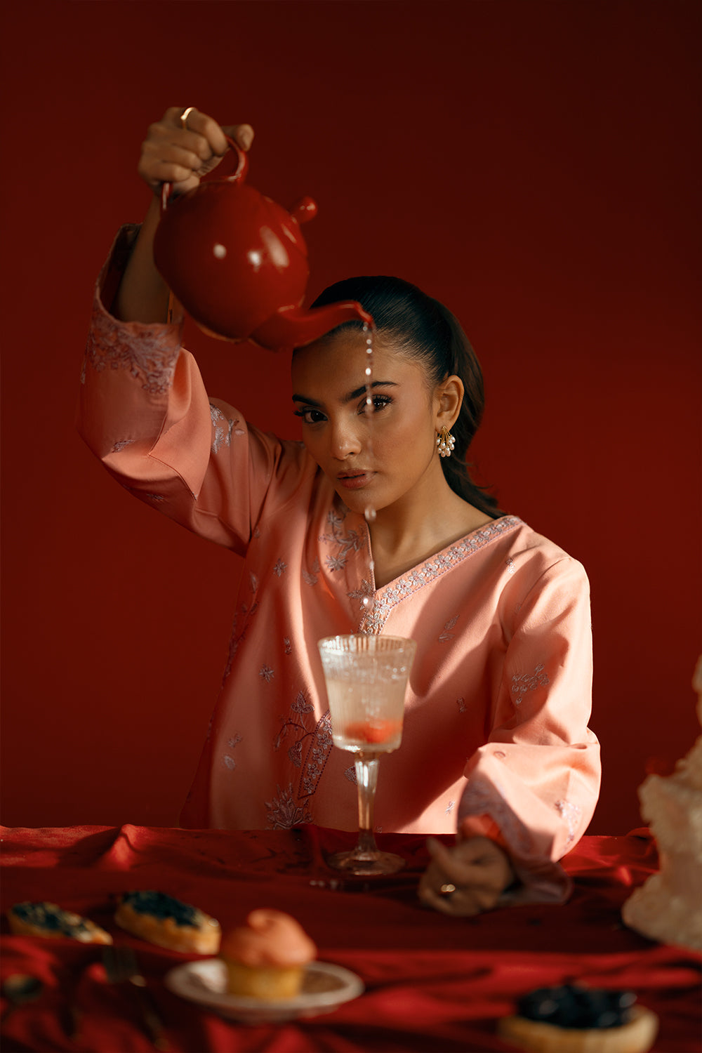 Model wearing peach embroidered outfit from Saira Rizwan Joolie | PEACH - JBP25-05, elegant Pakistani luxury pret available online in UK.