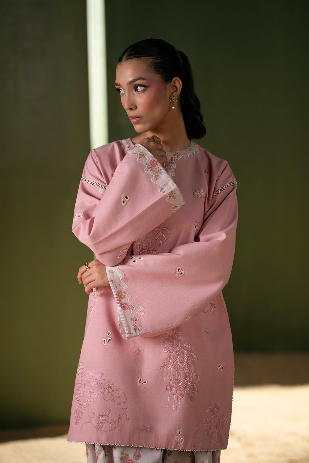 Model wearing pastel pink embroidered outfit from Saira Rizwan Joolie | JOOLIE PINK - JBP25-08, Pakistani luxury pret available online in UK.