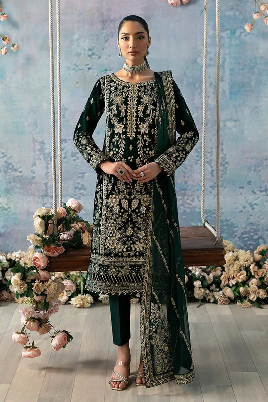 Model wearing Eden from Gulaal's Celeste Unstitched Velvet '24 collection in deep green. Luxury pret, festive, Pakistani clothes online in UK.