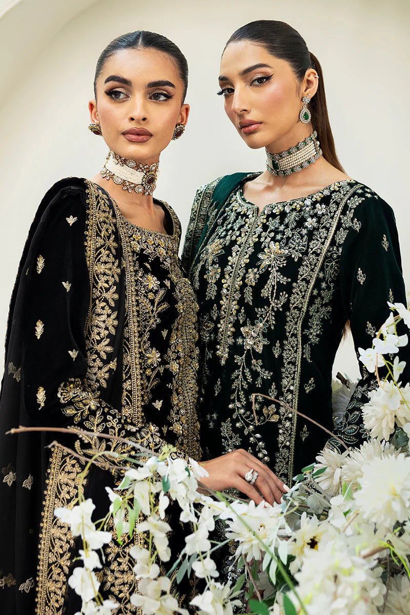 Model wearing Eden from Gulaal's Celeste Unstitched Velvet '24 collection in deep green. Luxury pret, festive, Pakistani clothes online in UK.