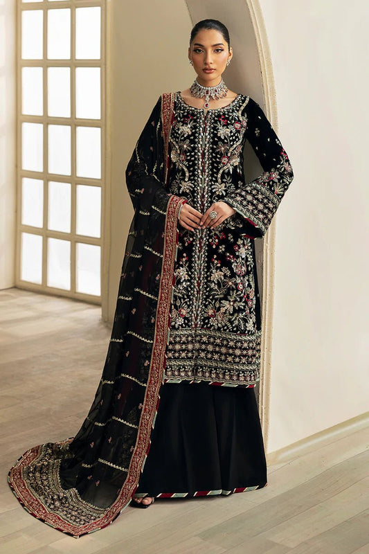 Model wearing Raven from Gulaal's Celeste Unstitched Velvet '24 collection in deep black. Luxury pret, festive, Pakistani clothes online in UK.