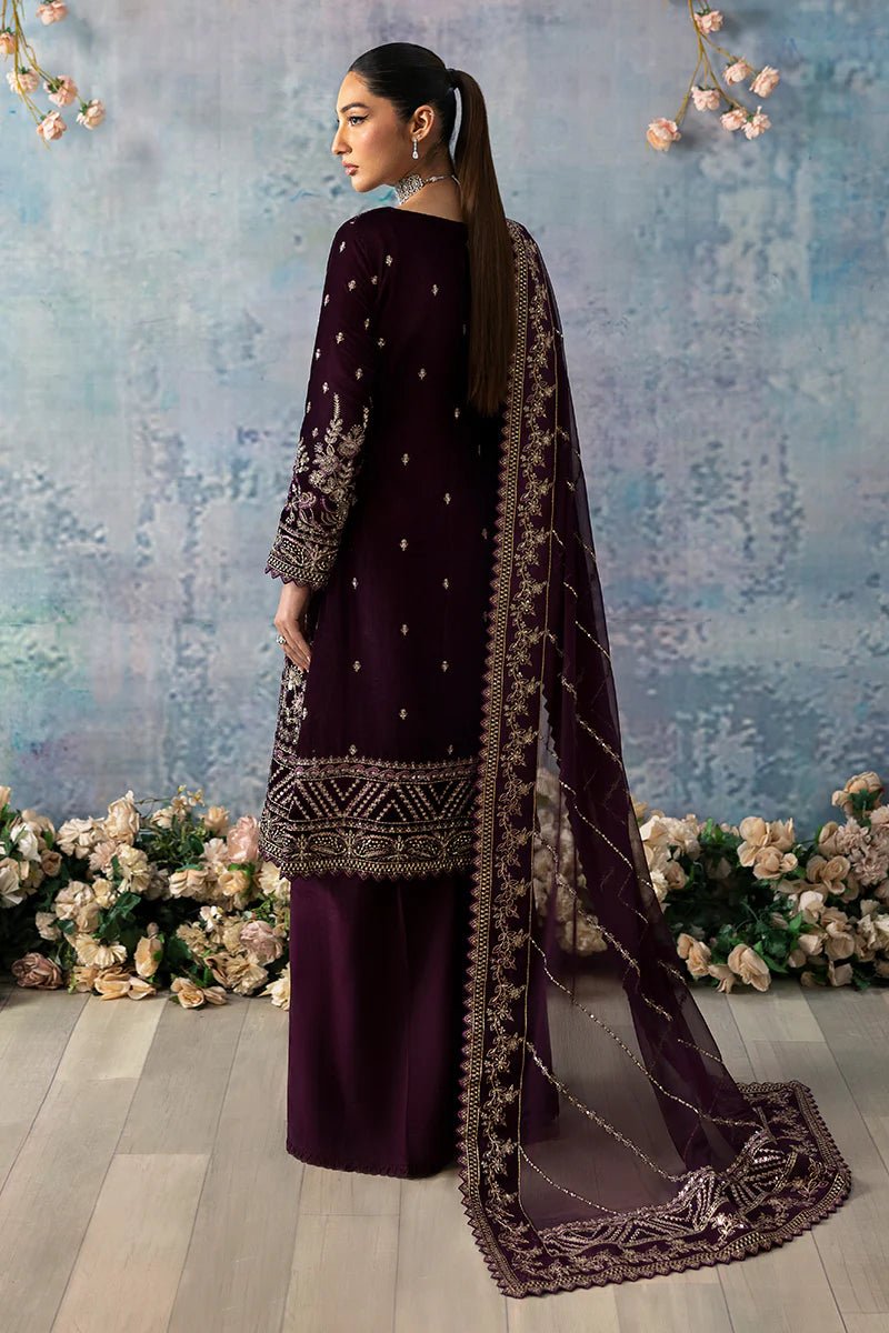 Model wearing Sangria from Gulaal's Celeste Unstitched Velvet '24 collection in deep maroon. Luxury pret, festive, Pakistani clothes online in UK.