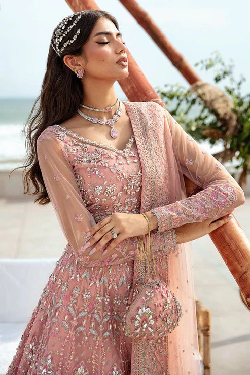 Model wearing Gulaal Azrina - GL - LP - 24V2 - 33 dress in soft pink from Emalyn Luxury Formals, ideal for weddings. Available for Pakistani clothes online in the UK.