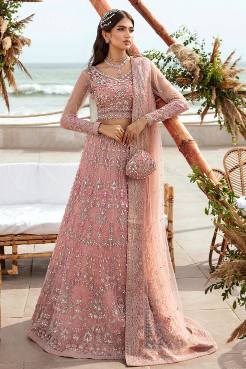 Model wearing Gulaal Azrina - GL - LP - 24V2 - 33 dress in soft pink from Emalyn Luxury Formals, ideal for weddings. Available for Pakistani clothes online in the UK.