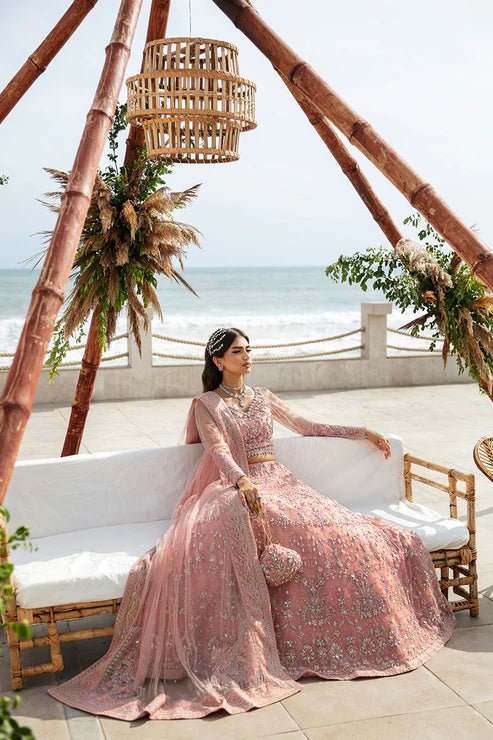 Model wearing Gulaal Azrina - GL - LP - 24V2 - 33 dress in soft pink from Emalyn Luxury Formals, ideal for weddings. Available for Pakistani clothes online in the UK.