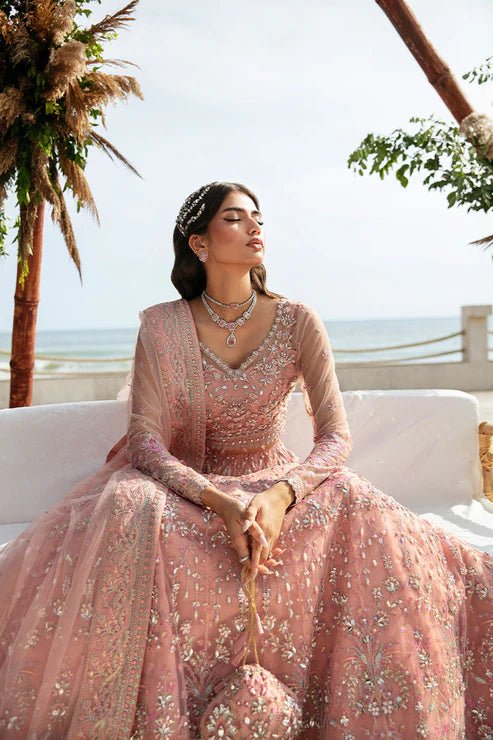 Model wearing Gulaal Azrina - GL - LP - 24V2 - 33 dress in soft pink from Emalyn Luxury Formals, ideal for weddings. Available for Pakistani clothes online in the UK.