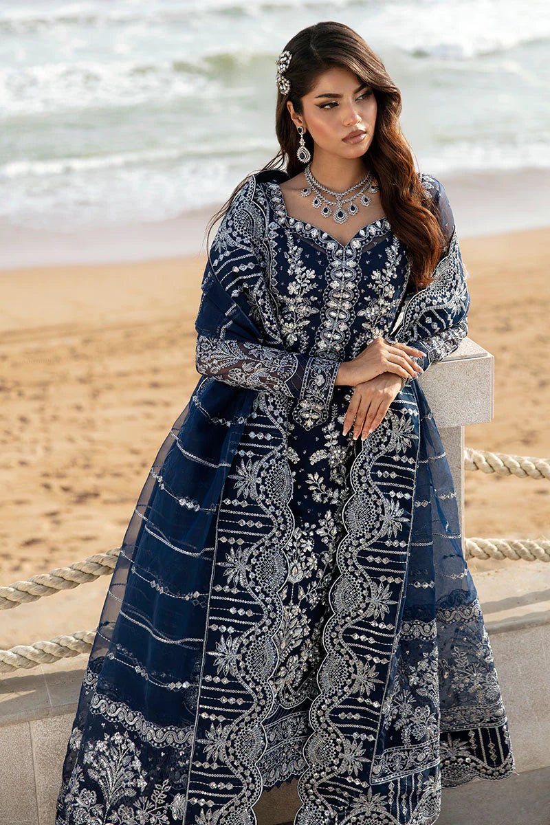 Model wearing Gulaal Celia - GL - LP - 24V2 - 30 dress in navy blue from Emalyn Luxury Formals, perfect for weddings and available for Pakistani clothes online in the UK.