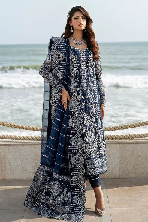 Model wearing Gulaal Celia - GL - LP - 24V2 - 30 dress in navy blue from Emalyn Luxury Formals, perfect for weddings and available for Pakistani clothes online in the UK.