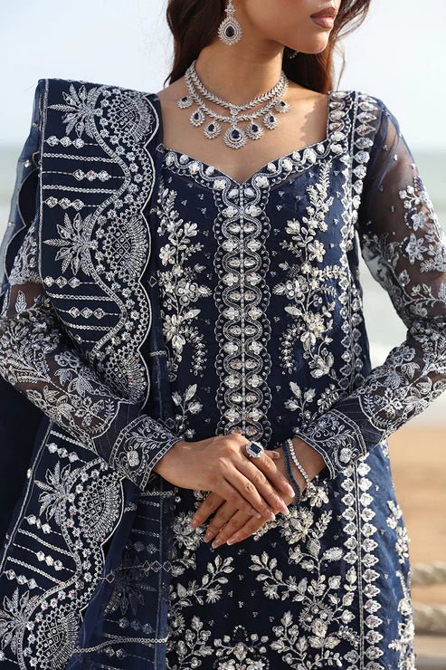 Model wearing Gulaal Celia - GL - LP - 24V2 - 30 dress in navy blue from Emalyn Luxury Formals, perfect for weddings and available for Pakistani clothes online in the UK.