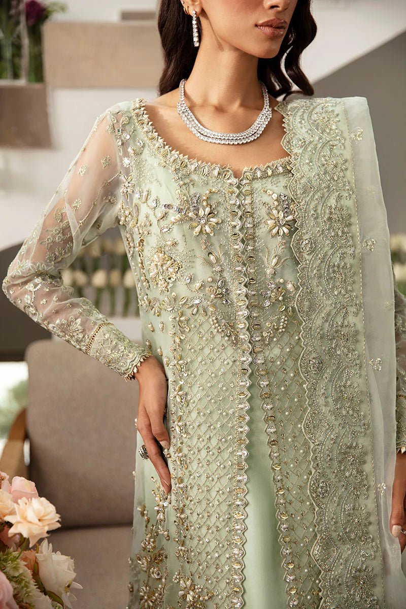 Model wearing Gulaal Kalisa - GL - LP - 24V2 - 27 dress in soft mint green from Emalyn Luxury Formals, ideal for weddings and Pakistani clothes online in the UK.