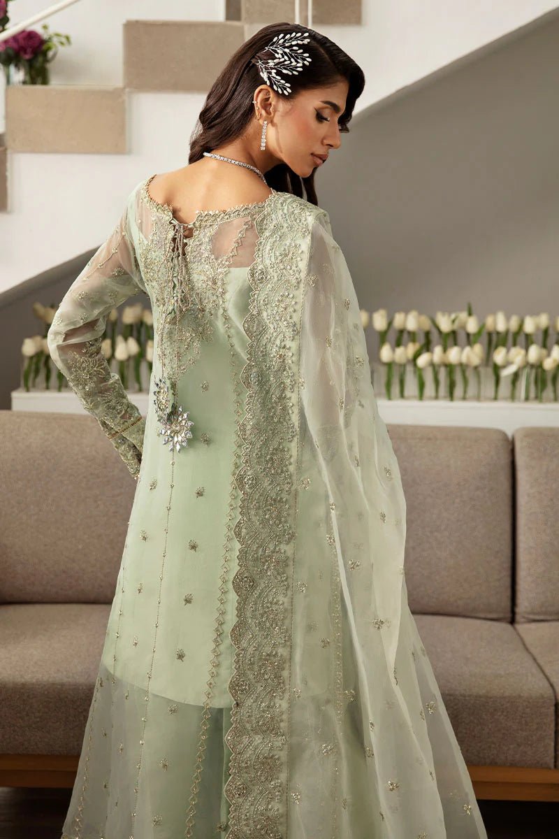 Model wearing Gulaal Kalisa - GL - LP - 24V2 - 27 dress in soft mint green from Emalyn Luxury Formals, ideal for weddings and Pakistani clothes online in the UK.