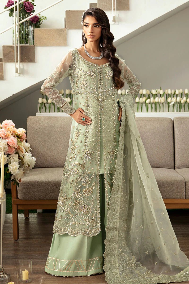 Model wearing Gulaal Kalisa - GL - LP - 24V2 - 27 dress in soft mint green from Emalyn Luxury Formals, ideal for weddings and Pakistani clothes online in the UK.