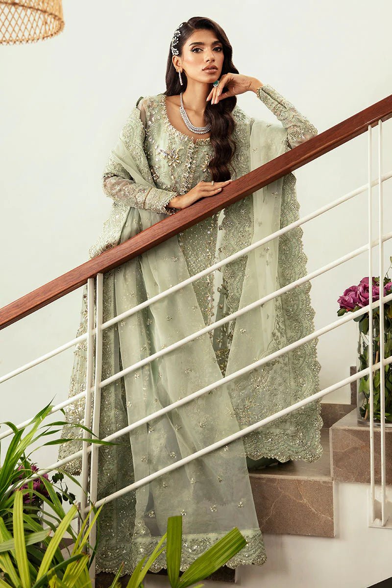 Model wearing Gulaal Kalisa - GL - LP - 24V2 - 27 dress in soft mint green from Emalyn Luxury Formals, ideal for weddings and Pakistani clothes online in the UK.