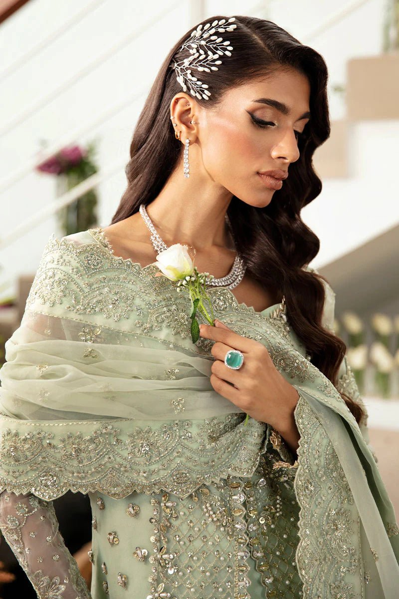 Model wearing Gulaal Kalisa - GL - LP - 24V2 - 27 dress in soft mint green from Emalyn Luxury Formals, ideal for weddings and Pakistani clothes online in the UK.