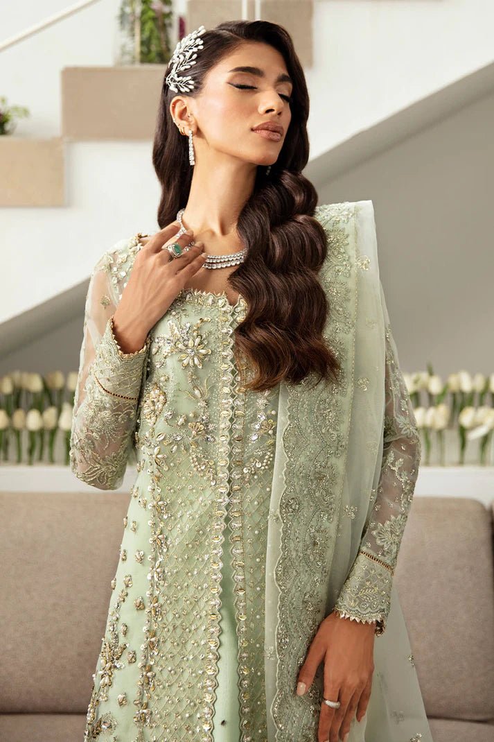 Model wearing Gulaal Kalisa - GL - LP - 24V2 - 27 dress in soft mint green from Emalyn Luxury Formals, ideal for weddings and Pakistani clothes online in the UK.